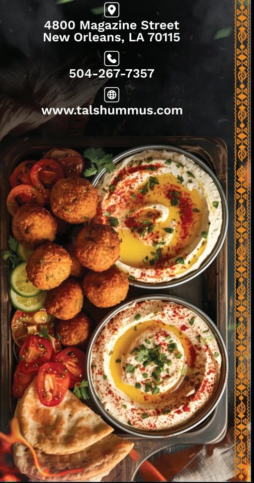 Catering trays of falafel, hummus and vegetables